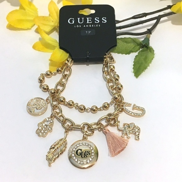 3/$29! GUESS Charm Bracelet Tassel, Elephant, Leaf - Picture 7 of 7